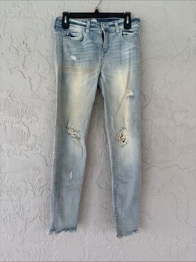 Sneak Peek Light Wash Distressed Women’s Jeans - Blue
